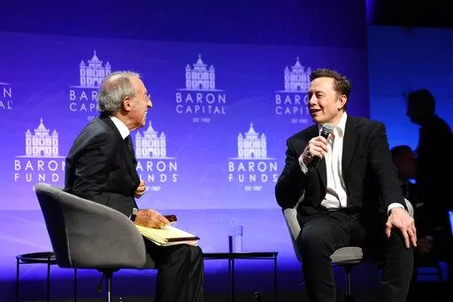 Baron Capital Group Chairman and CEO Ron Baron interviews Tesla CEO Elon Musk at the 29th Annual Baron Investment Conference in New York City on Friday, Nov. 4, 2022. ( Baron Capital via AP)