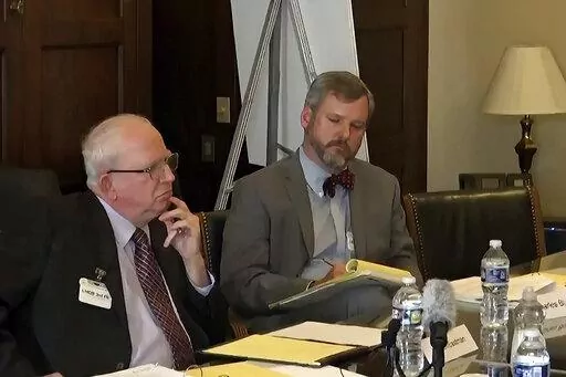 In this image from video released by the House Select Committee, John Eastman, a lawyer for former President Donald Trump, appears during a video deposition to the House select committee investigating the Jan. 6 attack on the U.S. Capitol at the hearing June 16, 2022, on Capitol Hill in Washington. Eastman says in a federal court filing that FBI agents have seized his cell phone. (House Select Committee via AP)