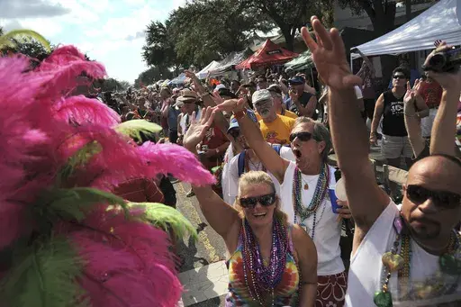 Hundreds of people line Central Avenue and cheer during the 10th Annual St. Pete Pride Street Festival & Promenade in St. Petersburg, Fla. on June 30, 2012. (Leah Millis/Tampa Bay Times via AP, file)