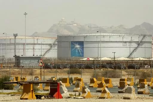 Storage tanks are seen at the North Jiddah bulk plant, an Aramco oil facility, in Jiddah, Saudi Arabia, on March 21, 2021. Oil giant Saudi Aramco said Sunday, March 12, 2023, it earned a $161 billion profit last year, attributing its earnings to higher crude oil prices.(AP Photo/Amr Nabil, File)