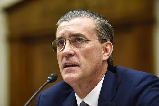 U.S. Special Representative for Afghanistan and Pakistan Richard Olson testifies on Capitol Hill in Washington on Dec. 16, 2015. Olson, who has signed a plea deal with prosecutors in January, is pushing federal prosecutors explain why he’s facing criminal charges for illegal foreign lobbying on behalf of Qatar while a retired four-star general who worked with him on the effort is not. (AP Photo/Susan Walsh, File)