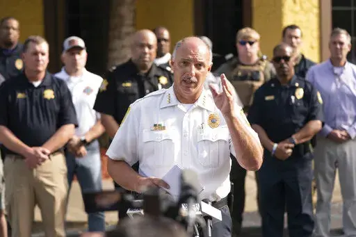 Columbia Police Chief Skip Holbrook speaks to members of the media near Columbiana Centre mall in Columbia, S.C., following a shooting, Saturday, April 16, 2022. (AP Photo/Sean Rayford)