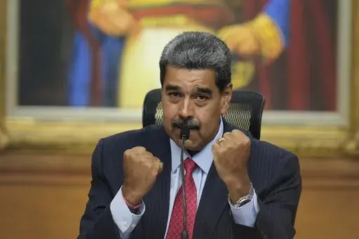 President Nicolas Maduro gestures during a news conference at Miraflores presidential palace in Caracas, Venezuela, July 31, 2024, three days after his disputed reelection. (AP Photo/Matias Delacroix, File)