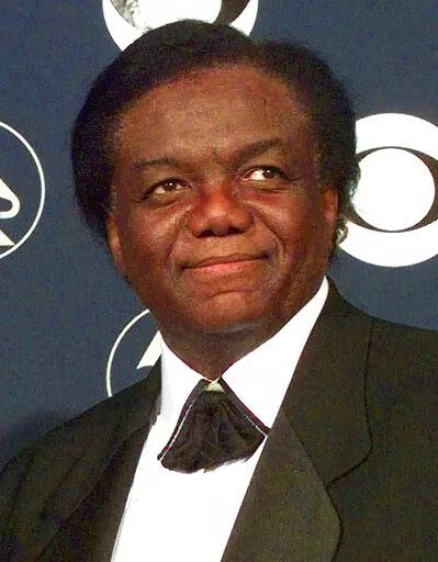 Songwriter/producer Lamont Dozier appears at the 40th Annual Grammy Awards in New York on Feb. 25, 1998. Dozier, of the celebrated Holland-Dozier-Holland team that wrote and produced “You Can’t Hurry Love,” “Heat Wave” and dozens of other hits and helped make Motown an essential record company of the 1960s and beyond, has died at age 81.  (AP Photo/Richard Drew, File)
