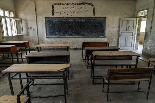 A classroom of a Hazara Shiite school sits empty in Kabul, Afghanistan, Sunday, July 31, 2022. The United Nations on Sunday, Sept. 18, 2022, called for Afghanistan's Taliban rulers to reopen schools to girls in grades 7-12, calling the anniversary of their exclusion from high school “shameful.” (AP Photo/Ebrahim Noroozi, File)