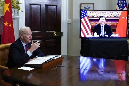 President Joe Biden meets virtually with Chinese President Xi Jinping from the Roosevelt Room of the White House in Washington, on Nov. 15, 2021. Biden set out to be the U.S. president who finally completed the "Asia pivot," Washington lingo for a long sought adjustment of U.S. foreign policy to better reflect the rise of America's most significant competitor: China. (AP Photo/Susan Walsh, File)