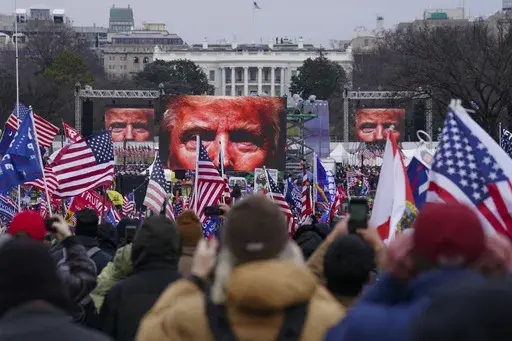 Supporters of Donald Trump participate in a rally in Washington, Jan. 6, 2021. The Supreme Court is hearing arguments Tuesday, April 16, 2024, over the charge of obstruction of an official proceeding that has been brought against 330 people, according to the Justice Department. The charge refers to the disruption of Congress' certification of Joe Biden's 2020 presidential election victory over former President Trump. Trump faces two obstruction charges. Next week, the justices will weigh whether