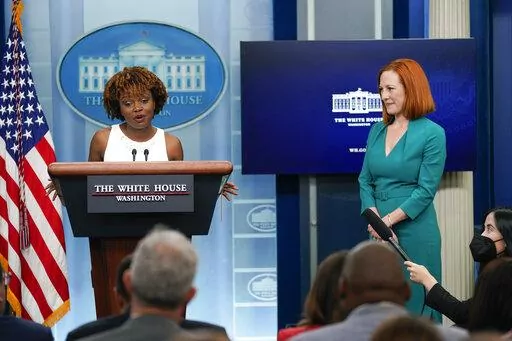 White House press secretary Jen Psaki, right, listens as incoming press secretary Karine Jean-Pierre speaks during a press briefing at the White House, Thursday, May 5, 2022, in Washington. (AP Photo/Evan Vucci)
