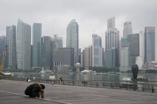 The central business district is shrouded by haze in Singapore, on Sept. 23, 2019. Singapore conducted its first execution of a woman in 19 years on Friday, July 28, 2023, and its second hanging this week for drug trafficking despite calls for the city-state to cease capital punishment for drug-related crimes. (AP Photo/Vincent Thian, File)