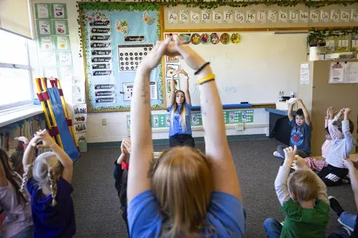 Teacher Abi Hawker leads preschoolers in learning activities at Hillcrest Developmental Preschool in American Falls, Idaho, Sept. 28, 2023. (AP Photo/Kyle Green, File)