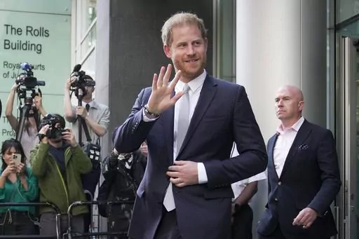 Prince Harry leaves the High Court after giving evidence in London, Wednesday, June 7, 2023. Prince Harry is seeking 320,000 pounds ($406,000) in his phone hacking lawsuit against Mirror Group Newspapers. The Duke of Sussex's lawyer submitted the claim in a court document Friday, June 30, 2023, at the conclusion of the trial that began in early May. (AP Photo/Kin Cheung, File)