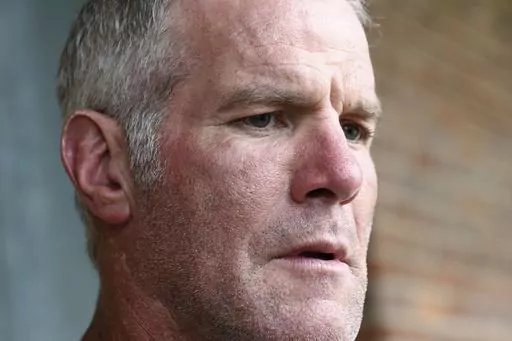 Former NFL quarterback Brett Favre speaks to the media, Oct. 17, 2018, in Jackson, Miss. The deposition hearing for the civil lawsuit against Favre in Mississippi's welfare scandal has been pushed back at the request of the athlete's attorneys, a court document filed Friday, Oct. 6, 2023, shows. (AP Photo/Rogelio V. Solis, File)
