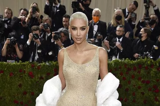 Kim Kardashian attends The Metropolitan Museum of Art's Costume Institute benefit gala celebrating the opening of the "In America: An Anthology of Fashion" exhibition on Monday, May 2, 2022, in New York. Reality tv star and entrepreneur Kim Kardashian has agreed to settle charges brought by the Securities and Exchange Commission and pay $1.26 million because she promoted on social media a crypto asset security offered and sold by EthereumMax without disclosing the payment she received for the pl