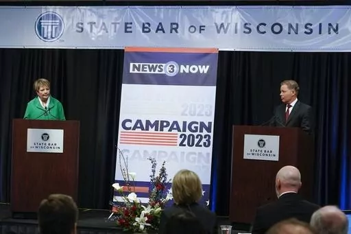 Wisconsin Supreme Court candidates Republican-backed Dan Kelly and Democratic-supported Janet Protasiewicz participate in a debate Tuesday, March 21, 2023, in Madison, Wis. The winner of the high stakes contest between Kelly and Protasiewicz will determine majority control of the court headed into the 2024 presidential election. (AP Photo/Morry Gash, File )