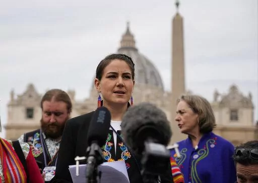 President of the Metis community, Cassidy Caron, speaks to the media in St. Peter's Square after their meeting with Pope Francis at The Vatican, Monday, March 28, 2022. The restitution of Indigenous and colonial-era artifacts, a pressing debate for museums and national collections across Europe, is one of the many agenda items awaiting Francis on his trip to Canada, which begins Sunday.  (AP Photo/Gregorio Borgia, File )