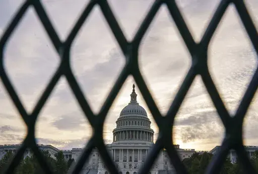 Security fencing shown around the Capitol in Washington, Sept. 16, 2021. Fencing installed around the U.S. Capitol for months after the January 2021 insurrection will be put back up before President Joe Biden’s State of the Union address on Tuesday as concern grows about potential demonstrations or truck convoys snarling traffic in the nation’s capital.  Capitol Police Chief Tom Manger said in a statement Sunday that the fence will be erected around the Capitol building for the speech and is