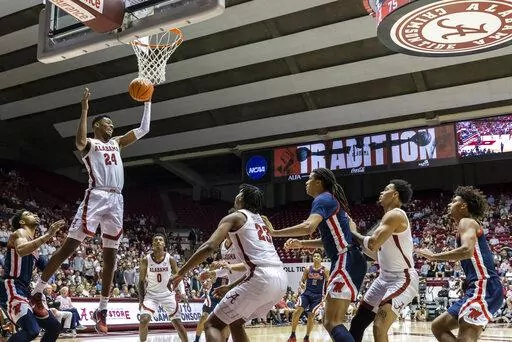 Alabama forward Brandon Miller (24) rebounds against Mississippi during the first half of an NCAA college basketball game, Tuesday, Jan. 3, 2023, in Tuscaloosa, Ala. (AP Photo/Vasha Hunt)