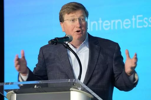 Republican Gov. Tate Reeves speaks in Bolton, Miss., Tuesday, Aug. 22, 2023. As Brett Favre became ensnared in media attention for his connection to Mississippi's sprawling welfare scandal, Reeves' brother suggested the state official investigating the case praise the retired NFL quarterback, according to screen shots of text messages released Thursday, Aug. 31, 2023, by Reeves' re-election campaign. (AP Photo/Rogelio V. Solis, File)