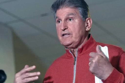 Sen. Joe Manchin, D-WVa., speaks to reporters on Capitol Hill in Washington, Tuesday, Jan. 18, 2022. ( AP Photo/Jose Luis Magana)