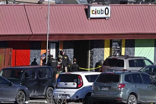Colorado Springs police, the FBI and others investigate the scene of a shooting at Club Q on Sunday, Nov. 20, 2022 in Colorado Springs, Colo. An attacker opened fire in a gay nightclub late Saturday night. (Helen H. Richardson/The Denver Post via AP)