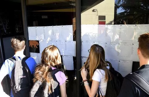 New students at Bear River High School, in Grass Valley, Calif., gather to see their school schedules during the first morning of school, Tuesday, Aug. 16, 2022, for the 2022-2023 school. ACT test scores made public in a report Wednesday, Oct. 12, 2022, reveal a decline in preparedness for college-level coursework. (Elias Funez/The Union via AP, File)