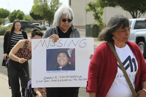 Families and victims advocates participate in a prayer walk around the Indian Pueblo Cultural Center to mark Missing and Murdered Indigenous Persons Day in Albuquerque, N.M., Sunday, May 5, 2024. (AP Photo/Susan Montoya Bryan, File)