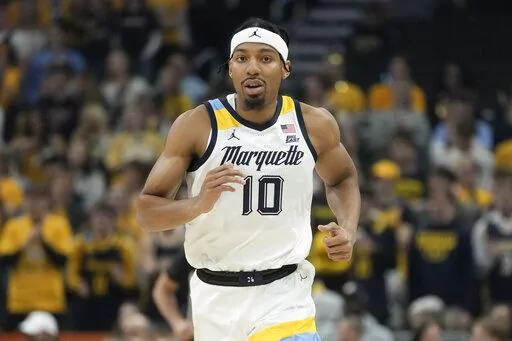 Marquette's Zach Wrightsil runs during the first half of an NCAA college basketball game against Radford Monday, Nov. 7, 2022, in Milwaukee. They already overcame the ravages of a hurricane to win a national title at their old school. Now former Loyola-New Orleans teammates Zach Wrightsil, Myles Burns and Brandon Davis are aiming for one more improbable achievement as they attempt to make the leap from their NAIA program and succeed at the NCAA Division I level. (AP Photo/Morry Gash)