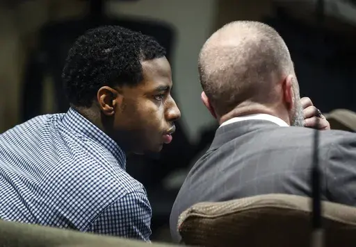Defendant Justin Johnson, left, appears in court as the murder trial of rapper Young Dolph begins in Memphis, Tenn., Monday, Sept. 23, 2024. (Mark Weber/Daily Memphian via AP, Pool)