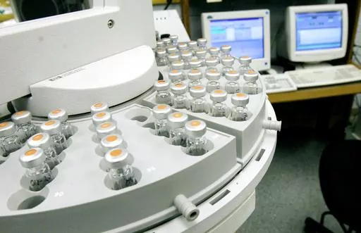 Evidence awaits testing in the toxicology lab at the state Crime Lab in Jackson, Miss., July 6, 2007. Incomplete homicide autopsy reports continued to pile up in Mississippi even as state leaders have touted tough-on-crime governance and a commitment to victims this year heading into the Nov. 7, 2024 general election. (AP Photo/Rogelio V. Solis)