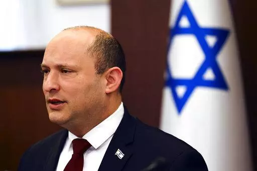 Israeli Prime Minister Naftali Bennett chairs a cabinet meeting at the Prime Minister's office in Jerusalem, Sunday, March 6, 2022. (Ronen Zvulun/Pool via AP)