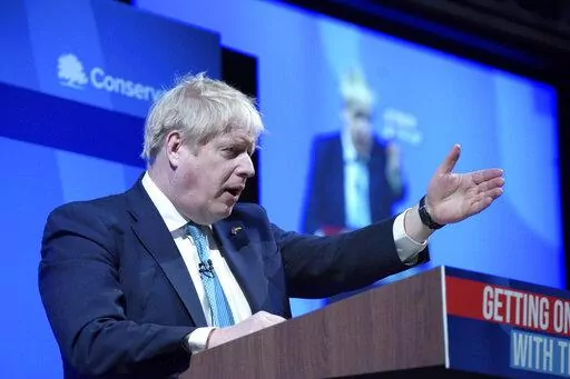 Britain's Prime Minister Boris Johnson speaks at the Conservative Party Spring Forum in Blackpool, England, Saturday March 19, 2022. (Peter Byrne/PA via AP)