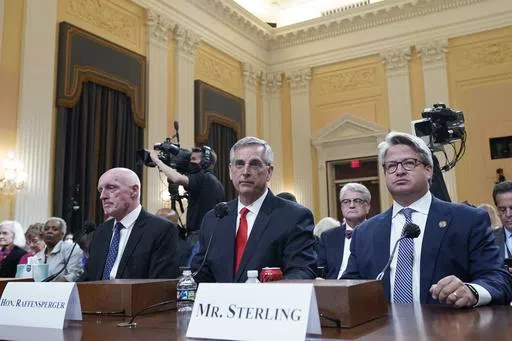 Rusty Bowers, Arizona state House Speaker, from left, Brad Raffensperger, Georgia Secretary of State, and Gabe Sterling, COO for the Georgia Secretary of State’s Office, attend a hearing investigating the Jan. 6 attack on the U.S. Capitol at the Capitol in Washington, June 21, 2022. With six months to go before the presidential election, concerns are running high among election officials that public distrust of voting and ballot counting persists. Sterling is part of an effort that seeks to br