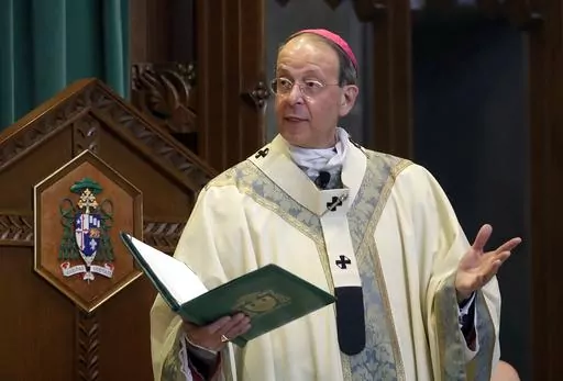 Baltimore Archbishop William Lori leads a funeral Mass in Baltimore on March 28, 2017. The Catholic Archdiocese of Baltimore announced Friday, Sept. 29, 2023, it filed for Chapter 11 reorganization days before a new state law goes into effect removing the statute of limitations on child sex abuse claims and allowing victims to sue their abusers decades after the fact. (AP Photo/Patrick Semansky, File)