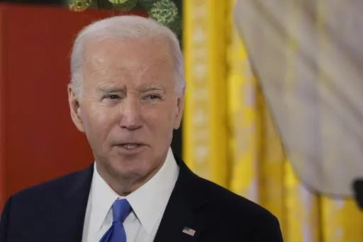 President Joe Biden speaks a Hanukkah reception in the East Room of the White House in Washington, Monday, Dec. 11, 2023. (AP Photo/Jacquelyn Martin, Pool)