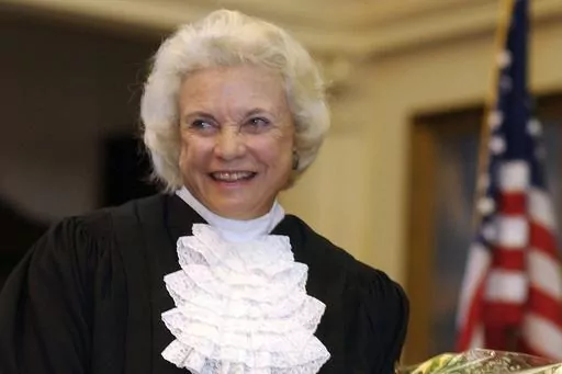 Supreme Court Justice Sandra Day O'Connor is shown before administering the oath of office to members of the Texas Supreme Court in Austin, Texas, on Jan. 6, 2003. For more than a decade, O'Connor was the only woman on the Supreme Court. And she was the first. Now the court has a record four. (AP Photo/Harry Cabluck, File )