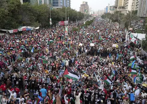 Supporters of the religious and political party Jamaat-e-Islami attend a demonstration against Israeli airstrikes on Gaza, to show solidarity with Palestinian people, in Karachi, Pakistan, Sunday, Oct. 15, 2023. (AP Photo/Fareed Khan)